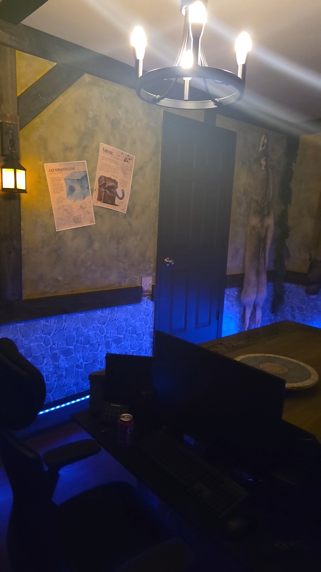 This is the table where we spend most of our time. I try to create the best possible experience for my players with dynamic lighting, spatial audio, miniatures, and terrain. Hopefully, we’ll have many more adventures in this room.